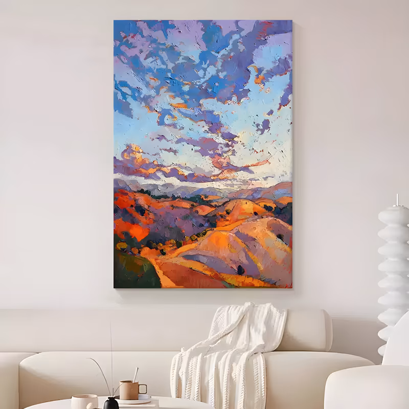 a large vertical impressionist landscape painting of orange and violet rolling hills in the lower third, under a wide sky of blue and lavender clouds edged with warm light, in blocky palette-knife oil