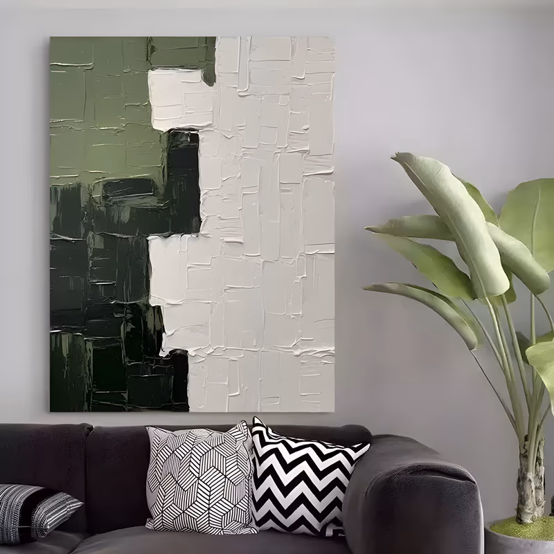 a large vertical abstract painting divided down the middle, blocks of deep forest green stacked on the left and off-white blocks on the right, all laid on in thick square palette-knife strokes