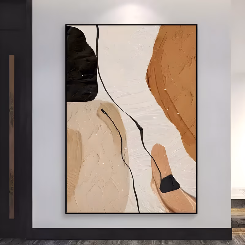 a large vertical plaster relief painting of rounded abstract shapes, a black form at top left, a sand beige mass at lower left and a rust brown curve down the right side, linked by a thin black line on white
