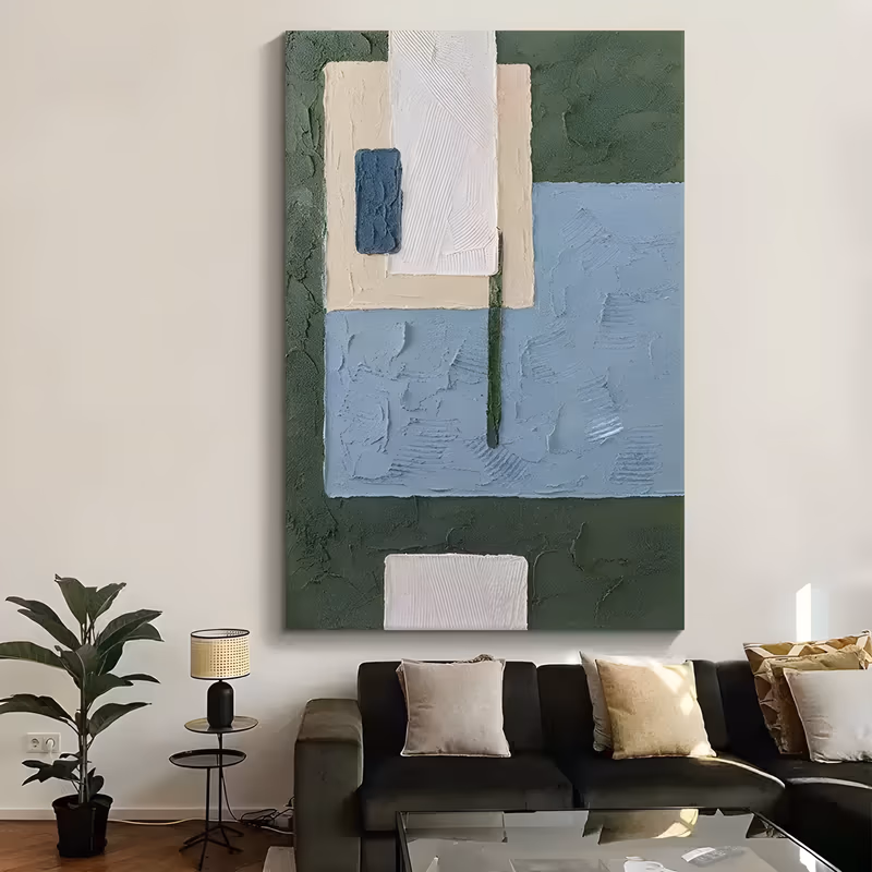a large vertical textured abstract painting of stacked plaster blocks in deep green, sky blue, cream and white with a small navy rectangle and a thin green line, raised in thick troweled relief
