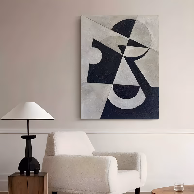 a large vertical geometric abstract painting of overlapping circles, half moons and triangles in near-black and warm gray, cut by a long diagonal, in chalky matte hand-painted acrylic