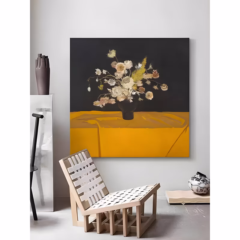a large square still life painting of pale cream and blush dried flowers in a dark round vase, standing on a mustard yellow draped cloth against a charcoal background, in soft blended oil