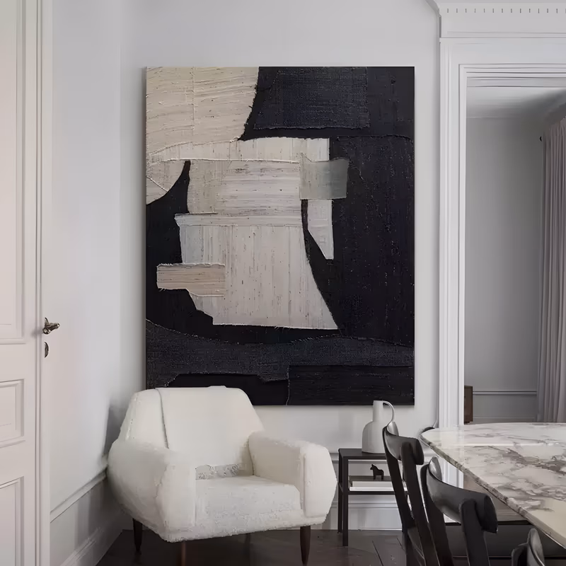 a large vertical abstract painting in the look of a textile collage, torn beige and cream panels overlapping deep black fields with frayed edges and coarse woven grain, in thick built-up relief