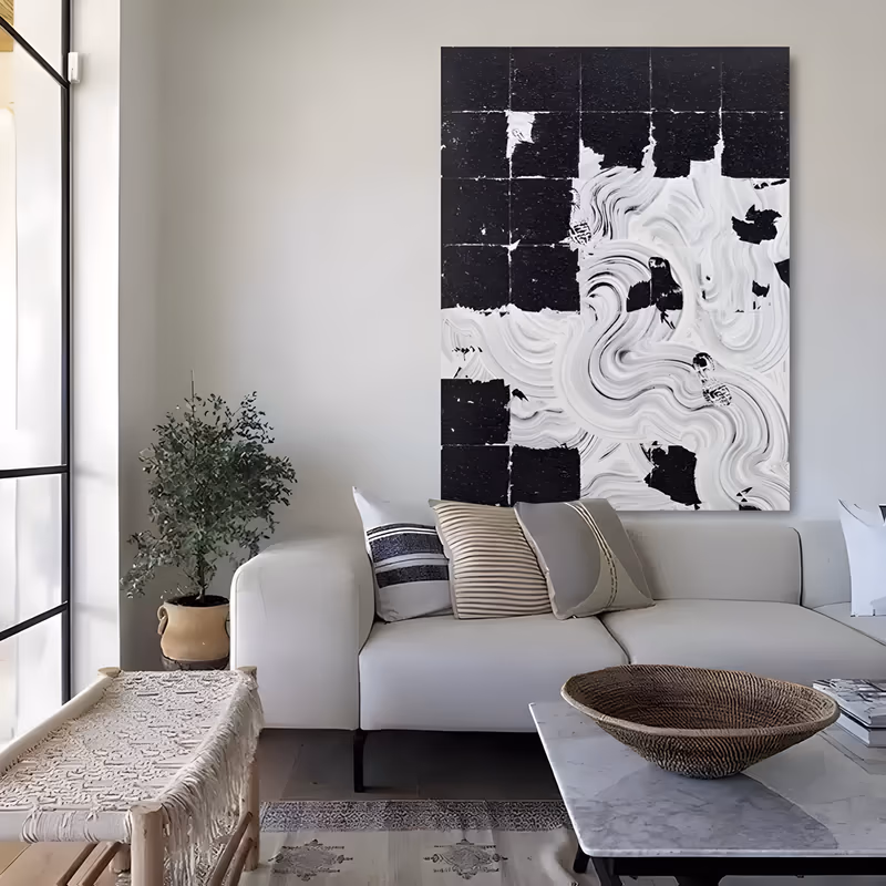 a large vertical abstract painting where a black grid of painted tiles at the upper left breaks into thick white swirling strokes at the lower right, the halves meeting on a diagonal, in heavy impasto
