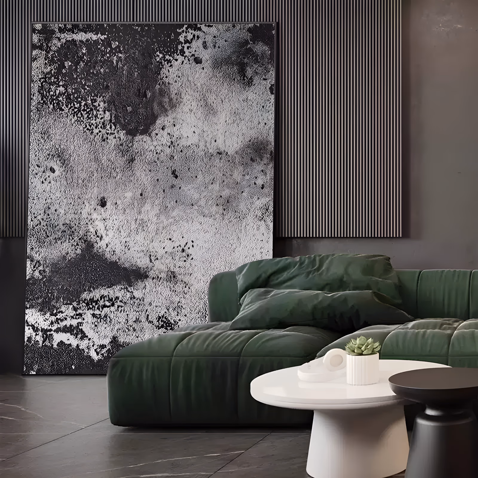a large vertical textured abstract painting of mottled black and white paint pitted like weathered stone, with dark clouded patches at the top and a pale chalky field below, in gritty heavy impasto