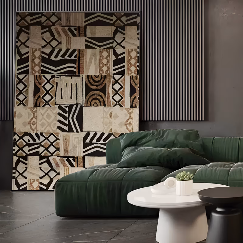 a large vertical abstract painting of a patchwork grid of African mudcloth motifs, with black and cream zigzags, diamonds, arcs and stripes over tan and brown blocks, in raised textured paint
