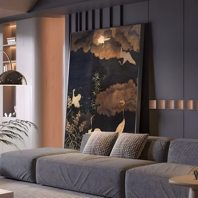 a large vertical textured painting of white cranes flying and standing among bronze and gold cloud shapes with green bamboo and pale reeds on a near-black chinoiserie ground, in raised metallic paint