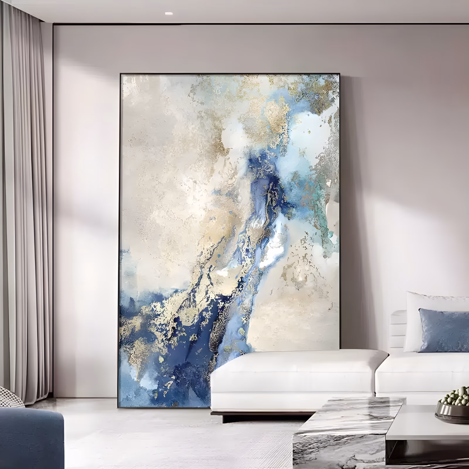 a large vertical abstract painting of marbled drifts, deep indigo pooling through the lower left and center against broad cream and ivory fields, laced with torn gold leaf, in textured oil