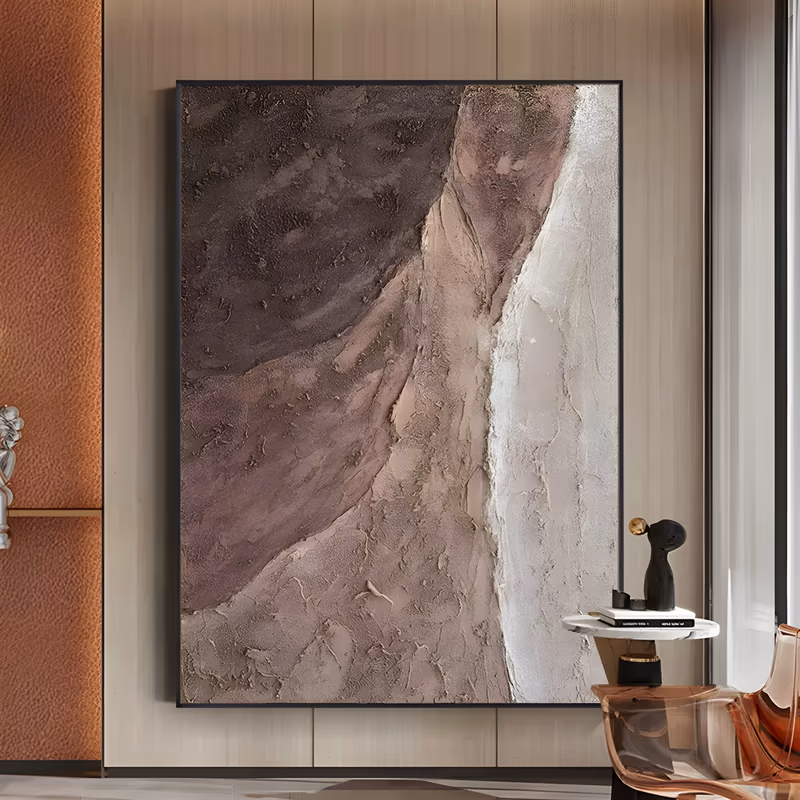 a large vertical plaster relief painting of a sloping ridge, deep plum-brown at the top left falling into mauve and sandy taupe, with a chalk-white band running down the right edge, in thick sculpted texture