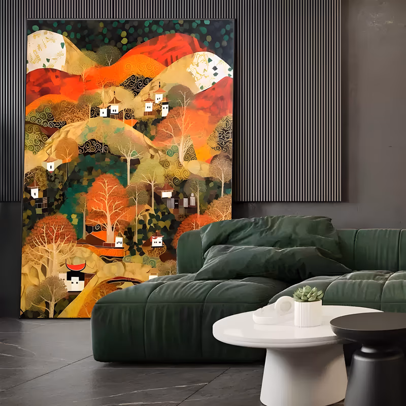 a large vertical folk-style painting of small white houses with red roofs scattered on patterned hills of red, gold and deep green, with bare pale trees in the foreground, in flat hand-painted acrylic