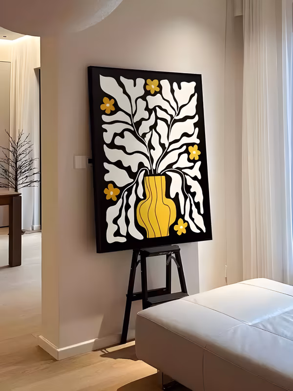 a large vertical minimalist painting of a wavy yellow vase at the center holding tall white cut-out leaves reaching the frame edges, with golden flowers scattered around them on a solid black ground, in flat acrylic