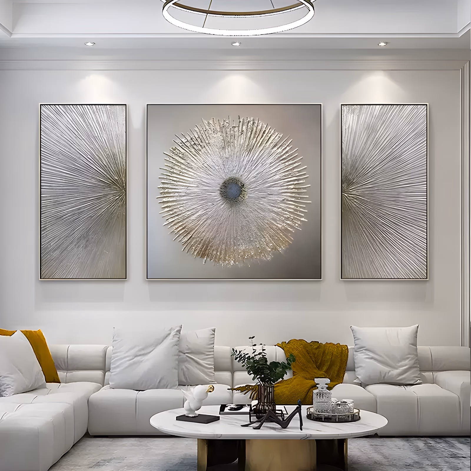 a set of three silver and white textured panels, a round sunburst radiating on the square center canvas between two tall fan-ray panels, worked in thick hand-troweled plaster with gold glints