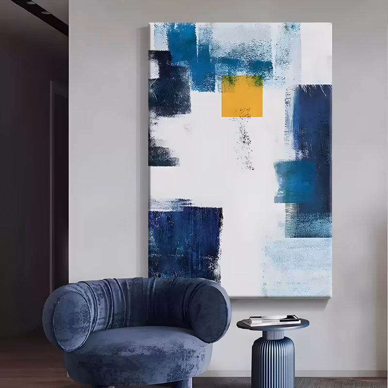 a large vertical abstract painting of dry-brushed teal and navy rectangles arranged around an open white field, with one small golden yellow square near the top center, in flat scraped acrylic