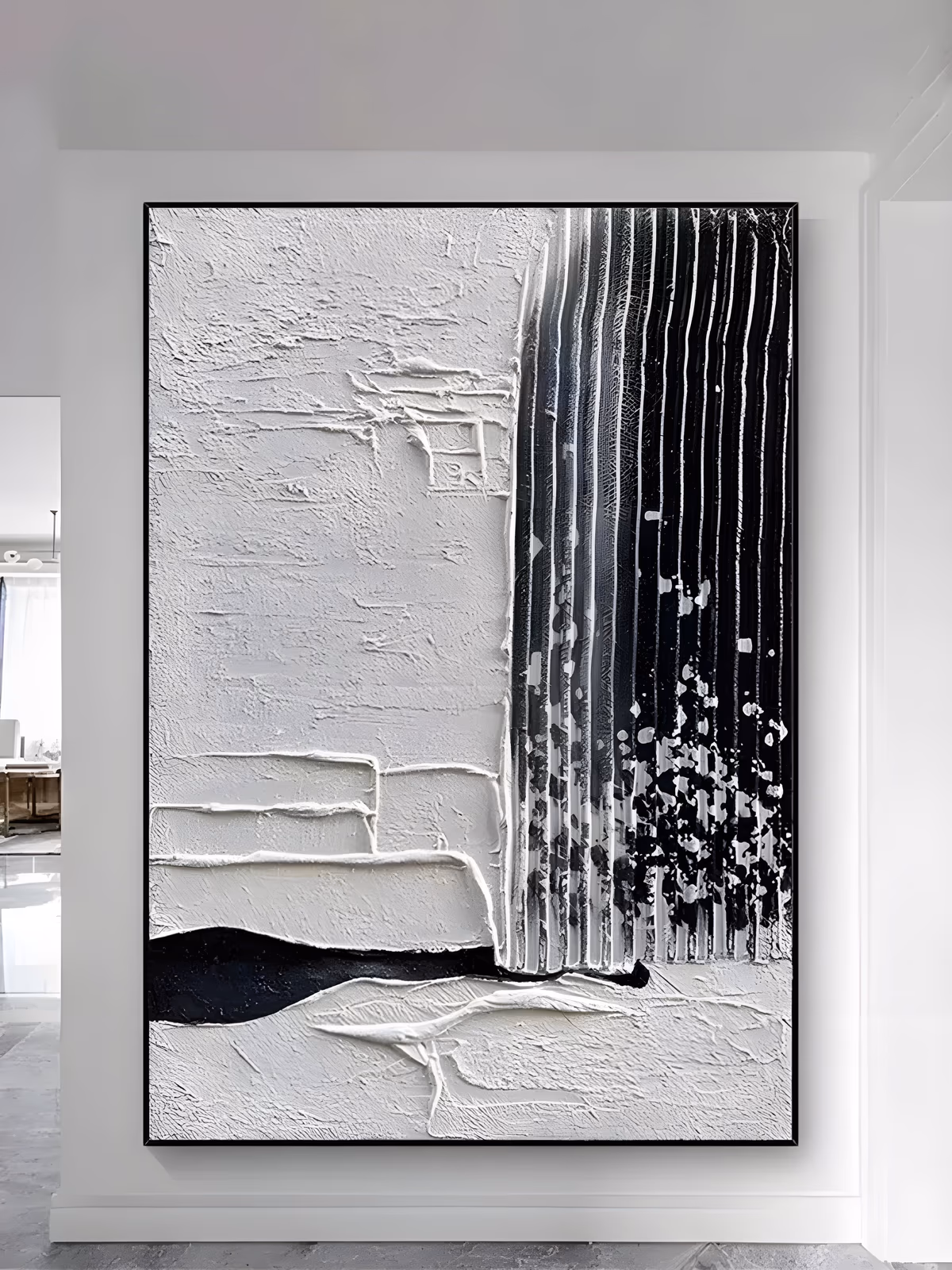 a large vertical black and white textured painting with a thick white plaster field on the left and a band of black vertical drip stripes on the right, speckled where the two meet, in heavy relief