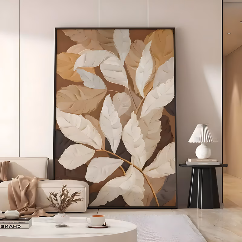 a large vertical relief painting of overlapping sculpted ivory and cream leaves branching from a gold-brown stem over a rust, tan and deep brown ground, raised in thick modeled plaster