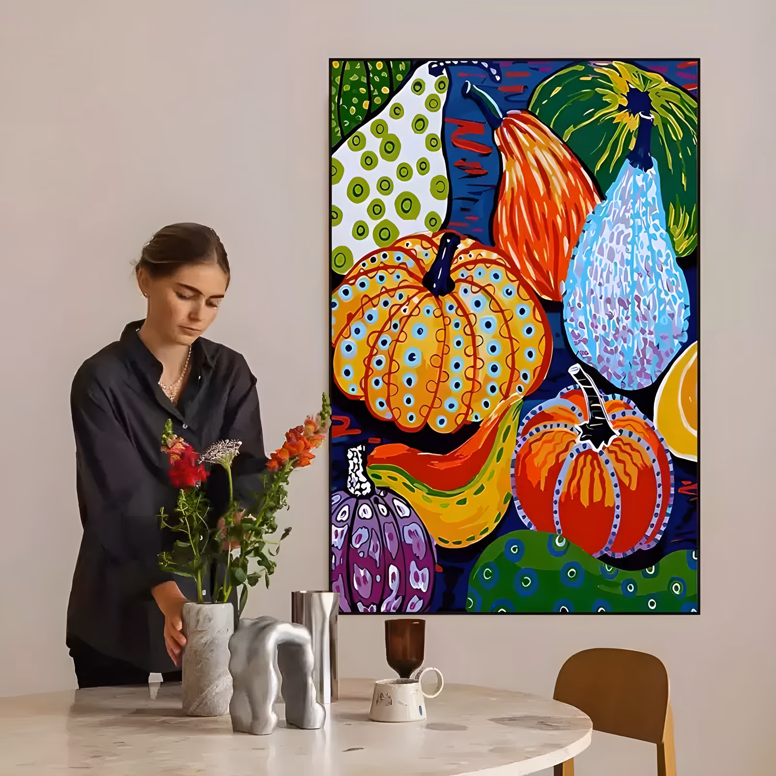 a large vertical pop art painting of stacked pumpkins and gourds in orange, yellow, purple and green, each one patterned with dots, rings and stripes against a navy blue ground, in flat bold acrylic