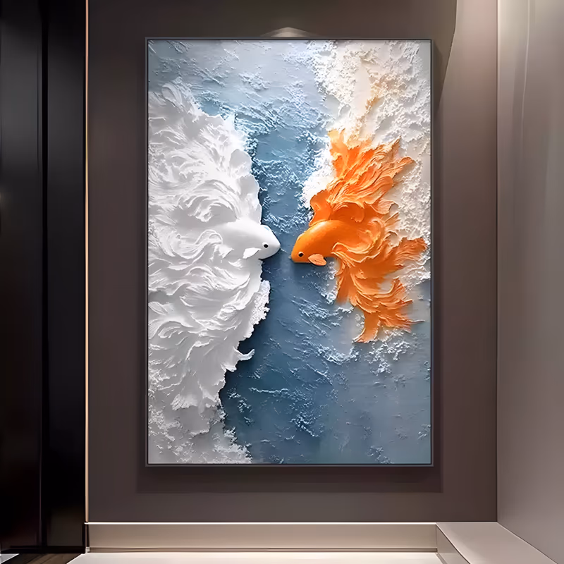 a large vertical relief painting of two koi facing each other, one white on the left and one orange on the right, their long fins carved into feathered plaster ridges over a blue-gray water ground