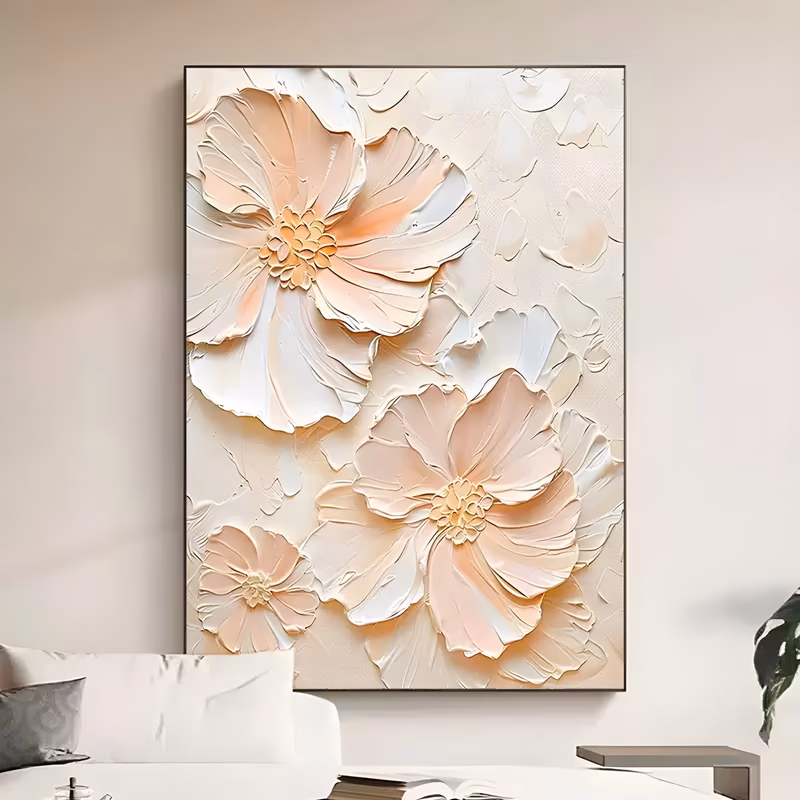 a large vertical relief painting of two big peach and white sculpted blossoms with gold-yellow centers, a smaller bloom at the lower left, on a cream plaster ground strewn with loose petals, in raised 3D texture