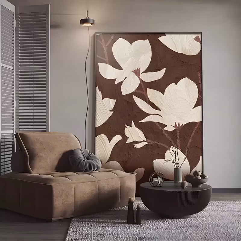 a large vertical textured canvas of cream magnolia blossoms and buds opening on slim mauve-brown branches, set against a deep chocolate plaster ground worked with thick knife strokes