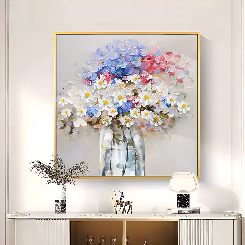 a large square impasto painting of a full bouquet of white daisies with yellow centers, blue and lavender hydrangea and pink blooms massed above a clear glass vase on a pale gray ground