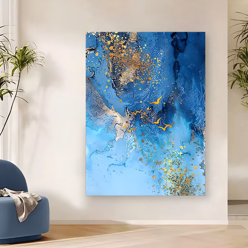 a large vertical abstract painting of deep cobalt and pale blue marbled water with a small flock of gold birds rising through the center and scattered gold foil flecks, in poured acrylic and gold leaf