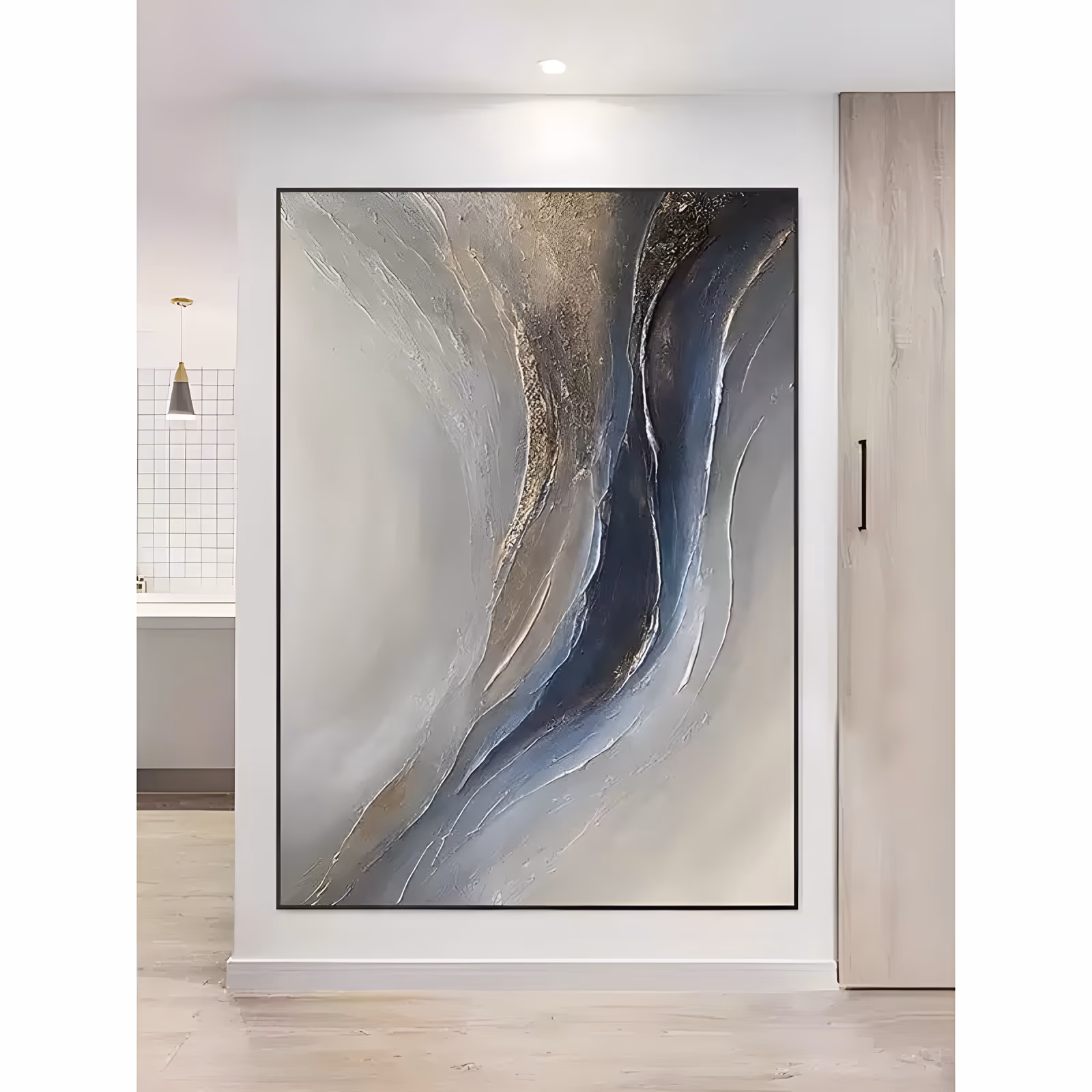 a large vertical abstract painting of a dark navy band flowing down the center of a pearl gray field, edged with rough gold and bronze, the surface swept into long knife strokes