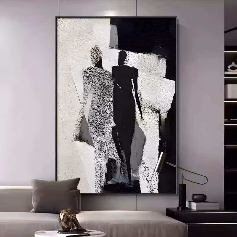 a large vertical figurative abstract painting of two elongated silhouettes, one white and one solid black, standing at the center of a torn black and white ground, in thick sculpted plaster relief