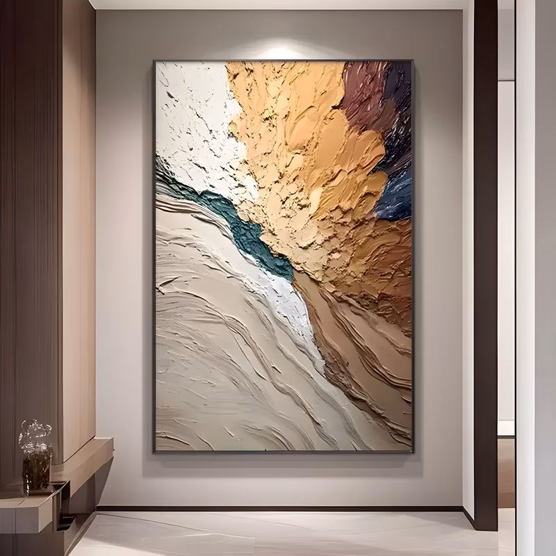 a large vertical plaster relief painting of thick sweeping waves, cream and white rising from the lower left into ochre, apricot and brown, with a teal streak and a plum-navy corner at the top right