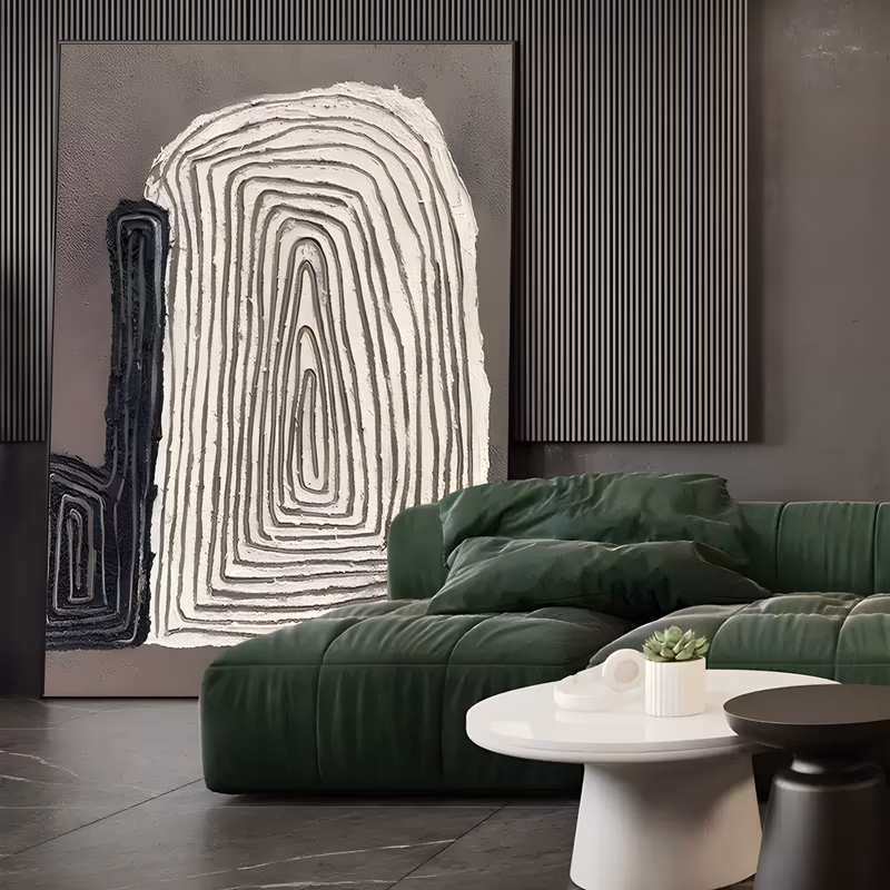 a large vertical minimalist plaster painting of concentric white arch-shaped ridges rising from the lower edge on a warm gray ground, with a narrow black textured column at the left, in sculpted relief