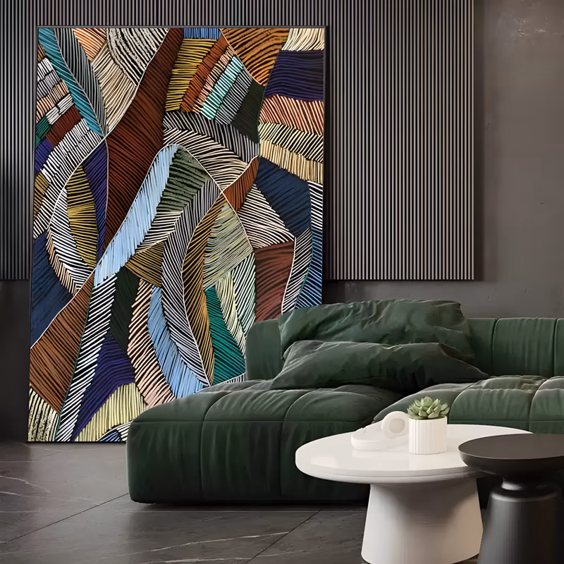 a large vertical textured painting of overlapping leaf and feather shapes packed together, each filled with fine ridged stripes in rust brown, navy, sky blue, olive green, cream and gold, in carved relief paint