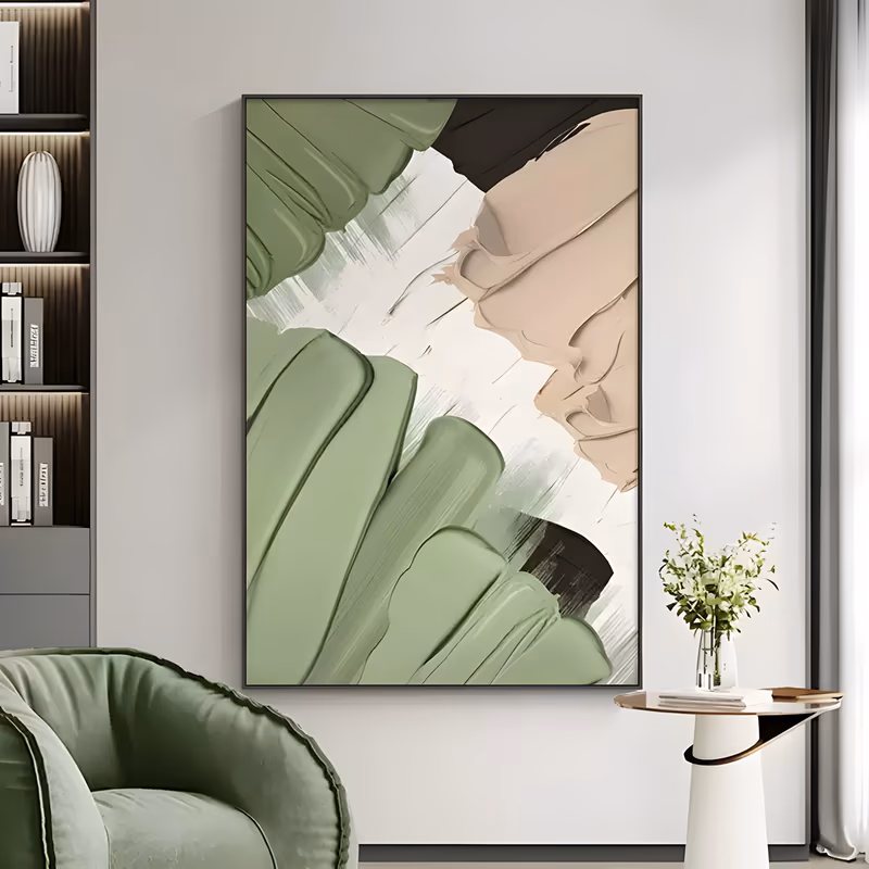 a large vertical abstract painting of broad sage green knife sweeps down the left side, a warm sand beige mass on the right and black wedges at the corners, all built in very thick raised paint on white