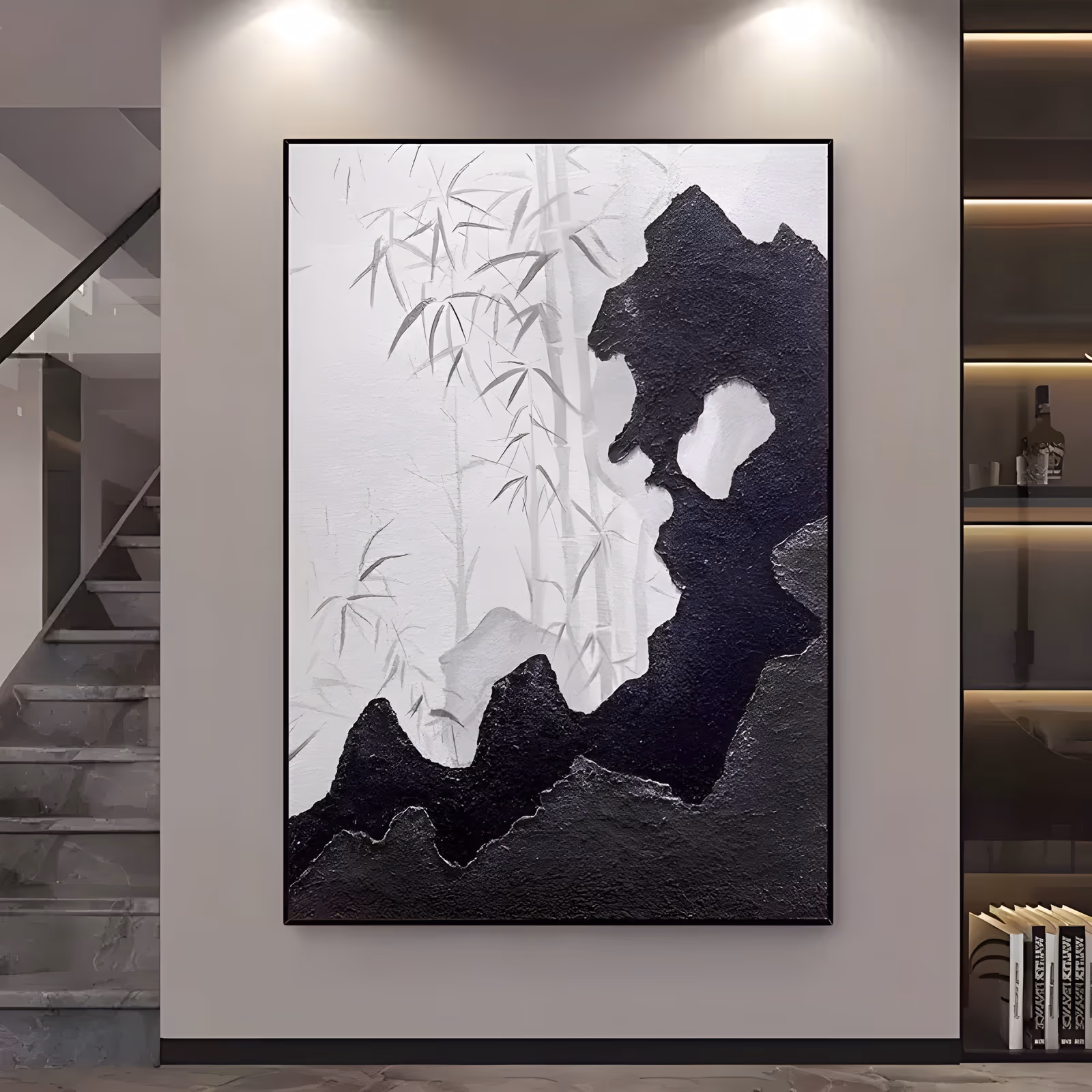 a large vertical textured painting of a bold black impasto rock form rising from the lower left to the upper right, with a white gap at its center and pale gray ink-wash bamboo behind it on a white ground