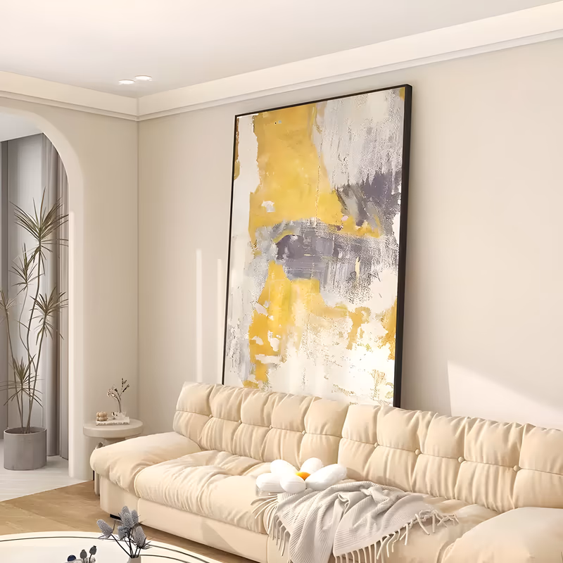 a large vertical abstract painting of mustard yellow and soft gray patches layered over a white plaster ground, with torn edges and scraped white marks over the yellow, in thick knife-worked paint