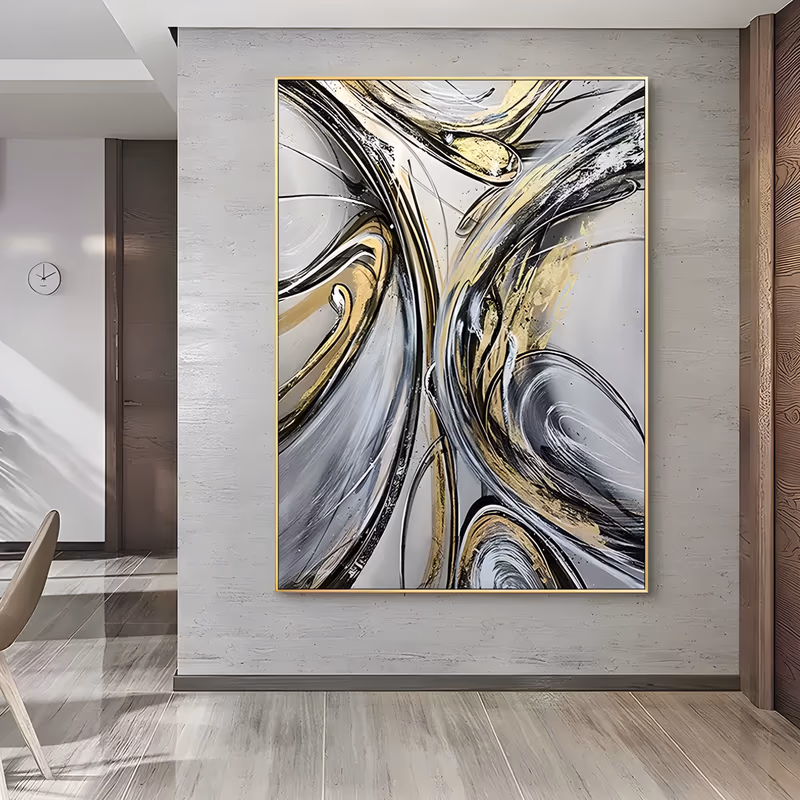a large vertical abstract painting of gold, black and white swirling ribbon lines curving through a silver-gray ground, with looping s-curves in the center, in glossy brushed acrylic