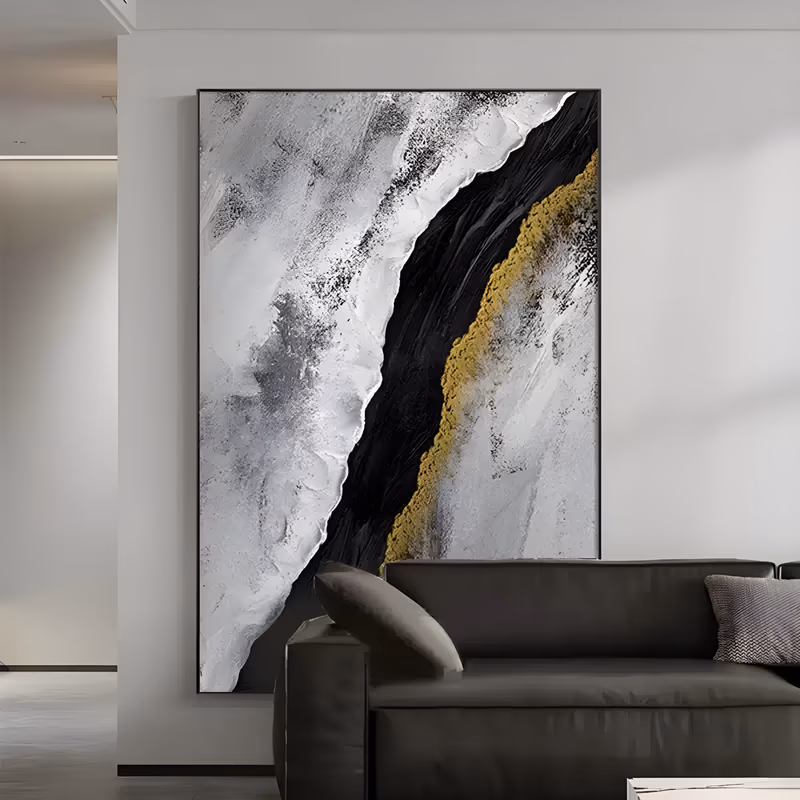 a large vertical abstract painting of a black diagonal band splitting a white sculpted plaster field, edged on one side with a raised gold-flecked ridge, in heavy relief acrylic