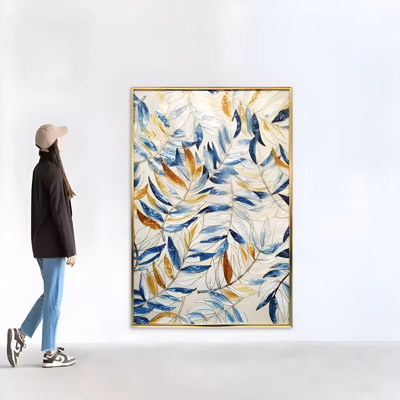 a large vertical botanical painting of long willow-like leaves and thin gold stems spreading over a cream ground, the leaves in denim blue, pale ice blue, mustard and rust, in hand-painted acrylic