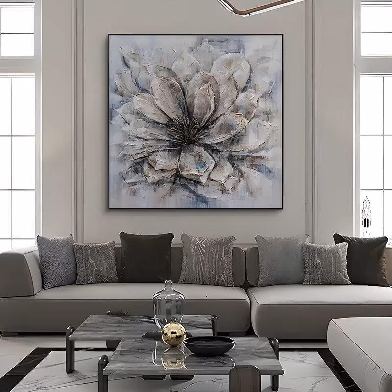 a large square textured painting of one wide magnolia bloom filling the frame, overlapping gray, white and taupe petals radiating from a dark inked center, built up in thick palette-knife oil