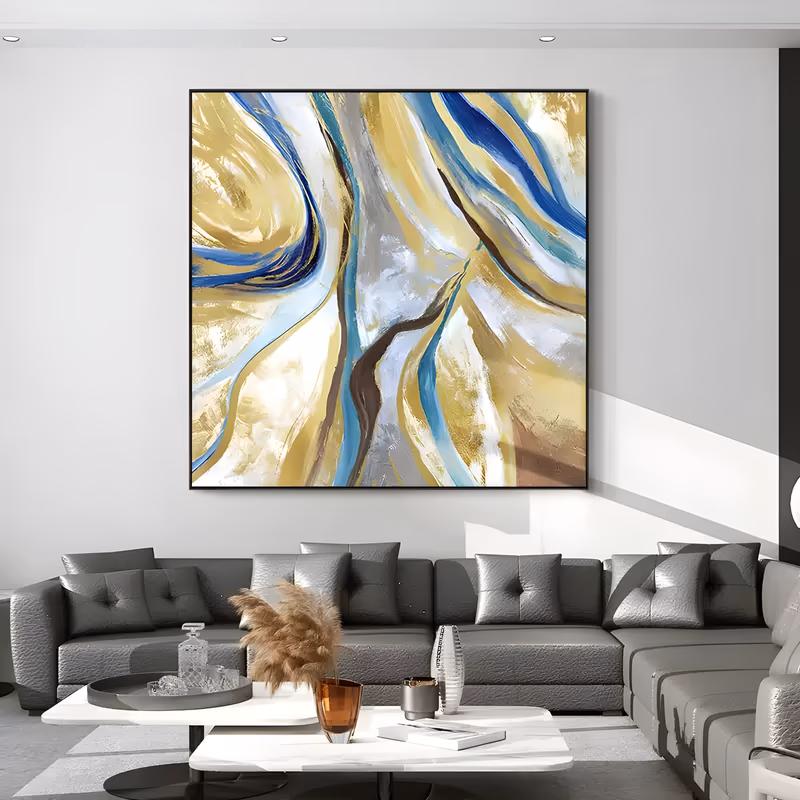 a large square abstract painting of gold, cobalt and pale blue ribbon strokes sweeping upward from a white and gray center, with brown accents, in thick brushed and knife-worked oil