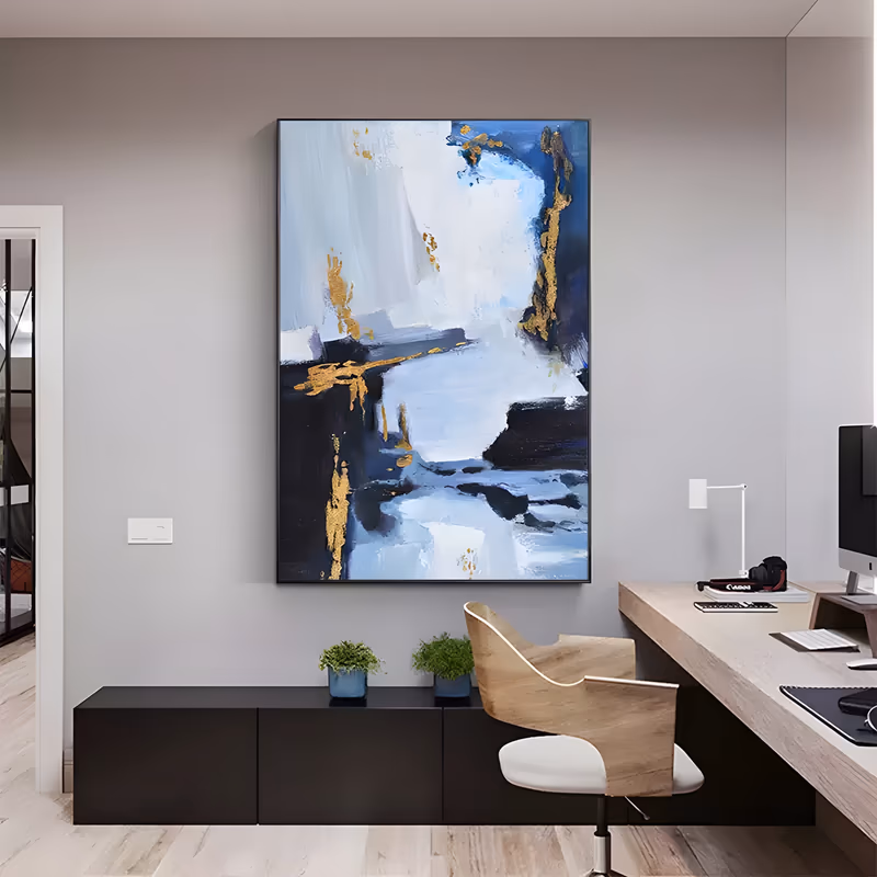 a large vertical abstract painting of broad navy, pale blue and white knife strokes stacked in layers, with torn gold leaf running down the left edge and upper right, in thick oil impasto