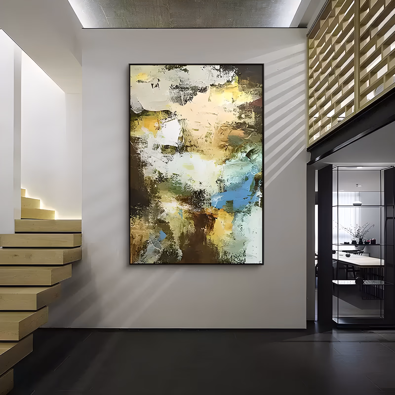 a large vertical abstract painting of layered olive green, cream, ochre and brown knife strokes with patches of sky blue at the lower right, in thick palette-knife impasto