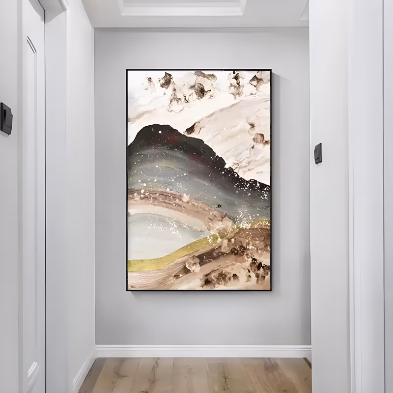 a large vertical abstract landscape painting of a dark speckled mountain rising under a cream sky, with a gold band and pale blue water below, built in heavy sculpted plaster relief
