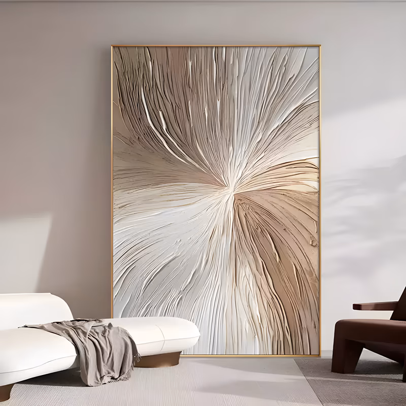 a large vertical relief painting of ridged plaster lines radiating from an off-center point, cool white and pale gray on the left and warm tan and brown on the right, like a fan of pressed fabric, in sculpted plaster