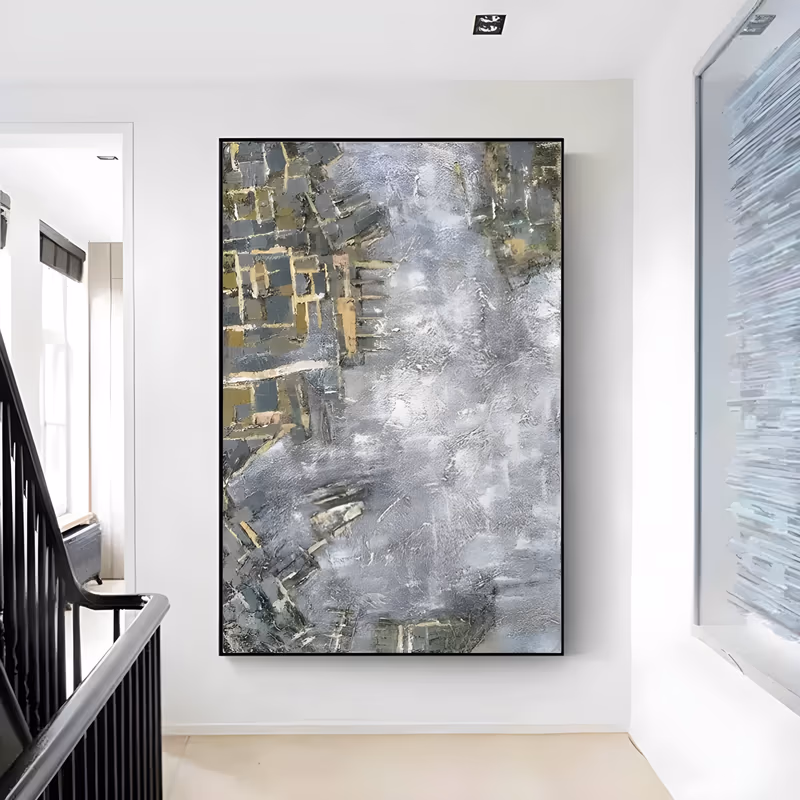 a large vertical abstract painting of a silver gray troweled field with clusters of olive, ochre and gold mosaic-like blocks gathered along the left edge and lower corner, in thick knife-applied impasto