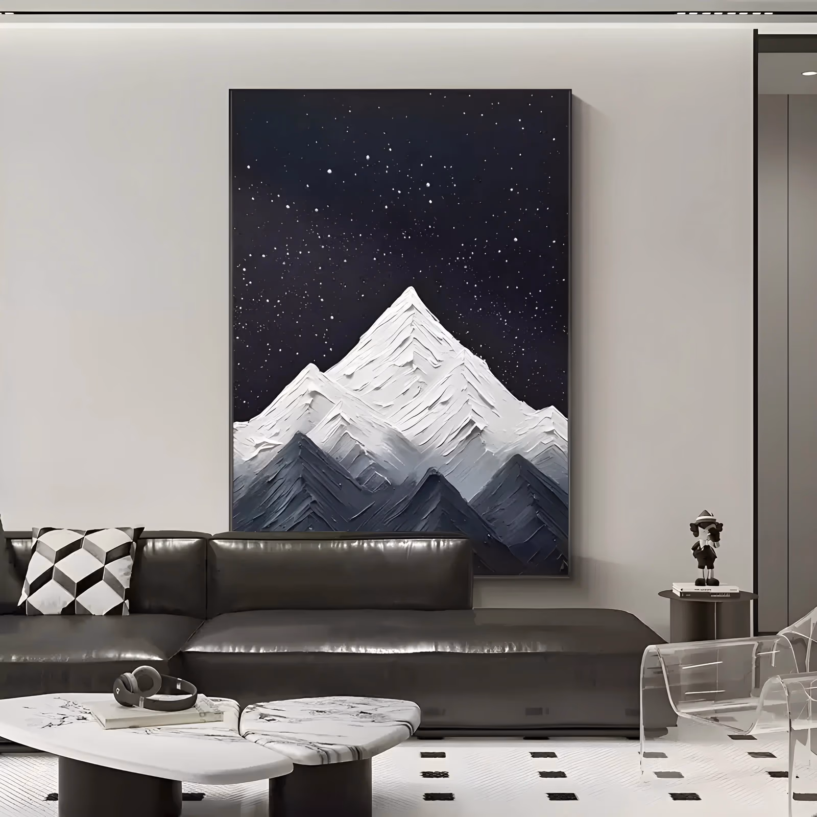 a tall vertical relief painting of white snow-covered peaks built in thick sculpted plaster, rising in the lower half of the frame against a near-black night sky flecked with small white stars