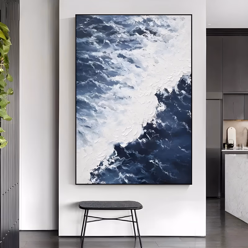 a large vertical impasto painting of the sea seen from above, a thick ridge of white foam curving down the center between deep navy water on the right and choppy gray-blue swell on the left, in heavy paint