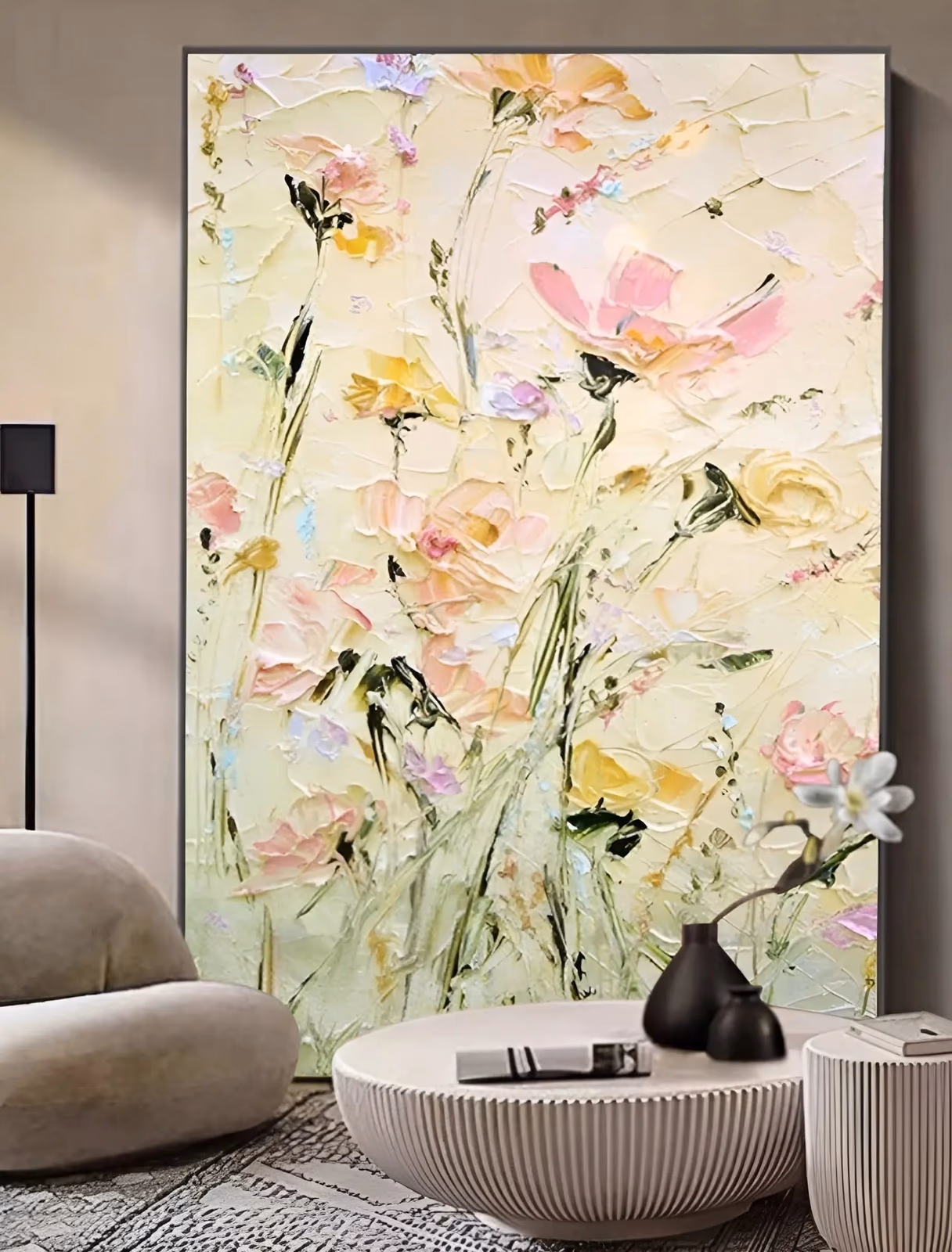 a large vertical textured floral painting of pink, peach and yellow wildflowers on tall stems with dark green leaves, set over a thickly worked cream ground, in hand-painted knife impasto