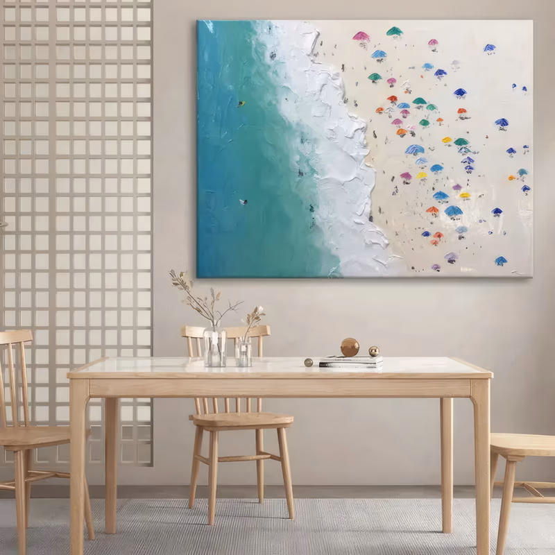 an oversized horizontal textured painting of a beach from above, turquoise water on the left breaking into a thick white band of surf and pale cream sand on the right dotted with multicolored umbrellas, in heavy impasto