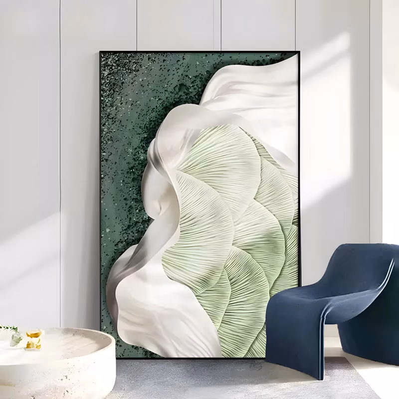 a large vertical relief painting of ribbed pale green leaf fans layered under smooth ivory draped forms on the right, set on a speckled dark green ground, sculpted in thick white plaster and paint