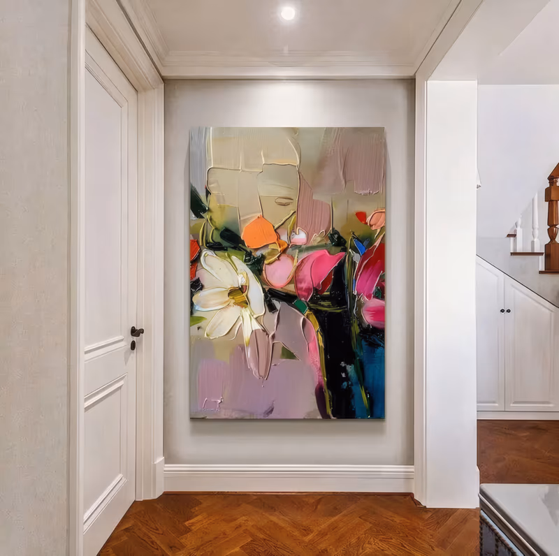 a large vertical floral painting of thick knife-laid blooms, a white daisy at center with magenta, pink and orange petals and dark green stems, set over cream, beige and mauve color blocks in heavy impasto