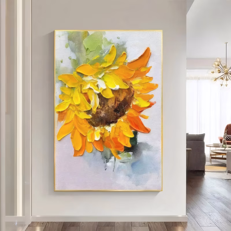 a large vertical textured floral painting of a single sunflower with thick sculpted yellow and orange petals around a dark brown center, set on a pale gray-green washed ground, in heavy impasto